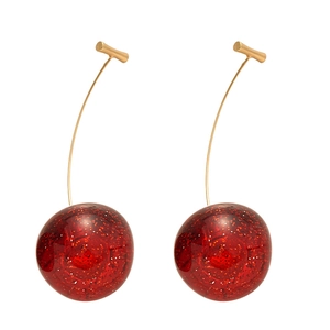 Sweet red resin cherry earrings with sparkling gold flakes and metal stems on white base