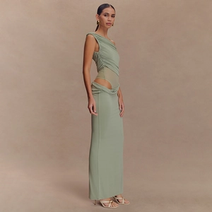 Detail view showing light green ruched texture and side cutout on one-shoulder maxi dress