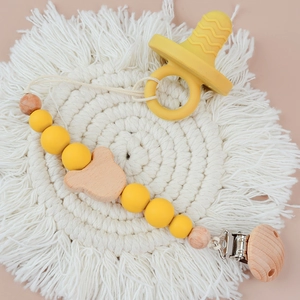 Silicone and wooden baby pacifier clip with yellow beads and cute bear shaped detail