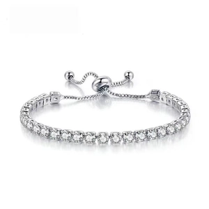 Adjustable silver tennis bracelet featuring 4mm round-cut cubic zirconia and slider clasp