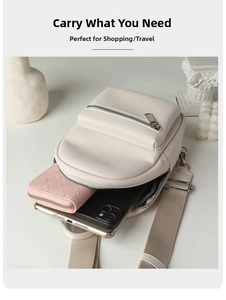 Spacious off-white pebble leather chest bag showing capacity for phone and wallet