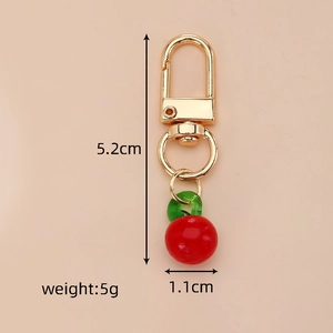 Detail view of 5.2cm cherry keychain with dimensions and red glass fruit pendant