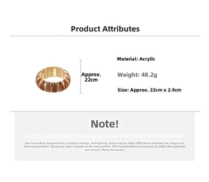 Detail view of brown acrylic marbled bracelet with dimensions 22cm by 2.9cm and weight 48.2g
