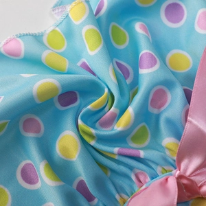 Light blue summer pet princess dress with colorful polka dots and pink ribbon accents