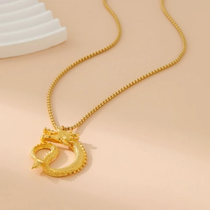 Minimalist gold-plated stainless steel dragon pendant necklace with detailed dragon carving