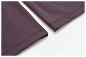 Detailed view of high-elasticity dark purple yoga set with reinforced double-stitch seams