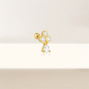 Detailed close-up of S925 silver star ear bone stud with gold finish and white zircon drop