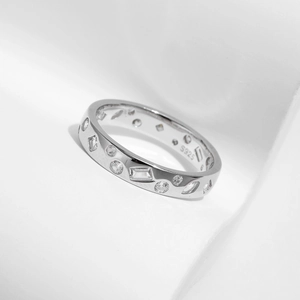 Irregular s925 silver ring featuring round and rectangular zircon stones on white background