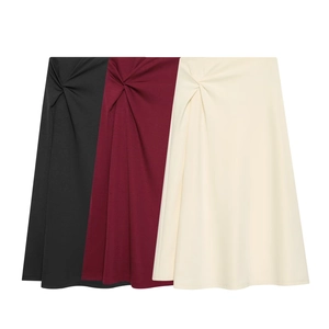 Elegant midi A-line skirt with a chic knot design in black, burgundy, and beige colors