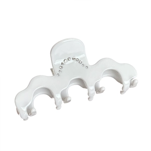 Elegant white wave-shaped acetate hair claw clip with sparkling rhinestones for women