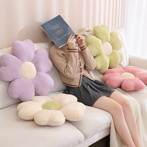 Floral velvet plush pillows in macaron colors on a sofa for home decor aesthetic