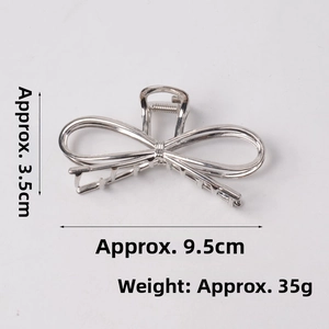 Silver bow alloy shark clip showing dimensions 9.5cm length and 3.5cm height
