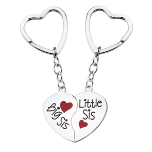 Silver metal heart-shaped Big Sis Little Sis puzzle keychain set for sisters