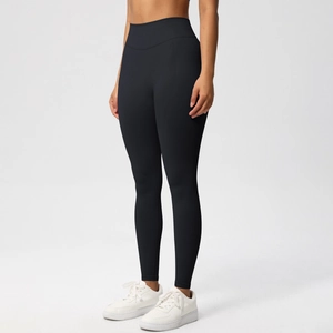 Detail of high-waist seamless yoga pants showing wide waistband and tummy control texture