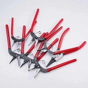 Industrial 4-piece snap ring pliers set with red ergonomic handles for precision DIY