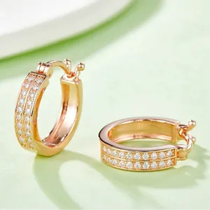Polished rose gold earrings with double rows of sparkling moissanite stones