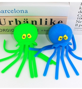 Blue and green squeeze octopus bath toys with elastic tentacles and yellow eyes