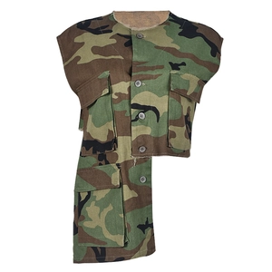 Detail of camouflage vest featuring multi-pocket utility design and asymmetric hemline