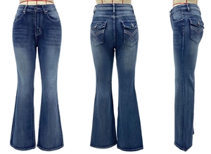Detail view of high-waisted flare jeans showing stitching and washed blue denim texture