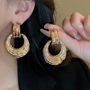 Vintage gold hammered wave geometric drop earrings for women with metallic texture