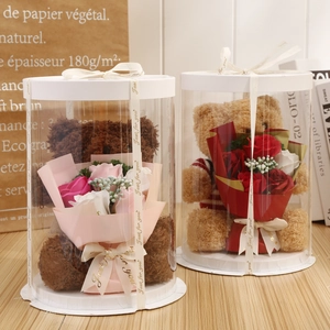 Detail of soap flower rose bouquet and plush teddy bears in round gift packaging
