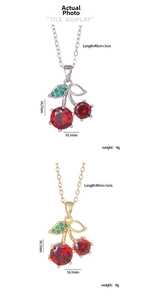 Detail view of red cherry pendant showing 16.1mm size and 40cm plus 5cm chain length