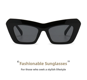 Detailed close-up of thick black retro sunglasses frames with dark gray tinted lenses