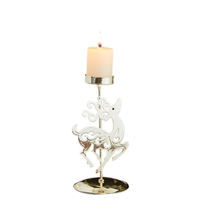 Silver metal reindeer candle holder with a white pillar candle for Christmas decor
