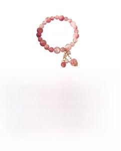 Pink crystal bead bracelet with alloy charms weighing 14g and measuring 16cm long