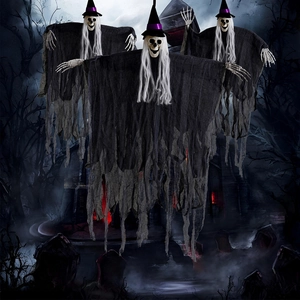 Three hanging Halloween skeleton ghosts with purple hats in a spooky graveyard scene