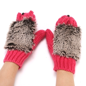Cute women warm knitted mittens with fluffy hedgehog design, cozy pink fleece winter gloves.