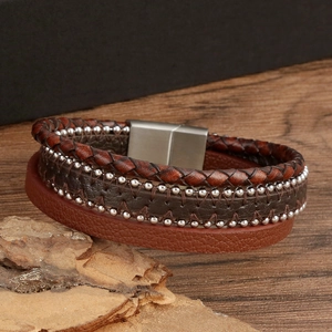 Multilayer brown leather woven bracelet with metal rivets and magnetic clasp on stone