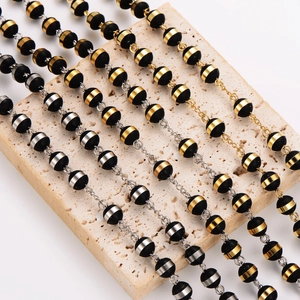 8mm black beaded necklace set with 18K gold plated stainless steel accents and links