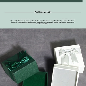 Close-up of luxury gift box with ribbon bow and soft grey flocking sponge lining