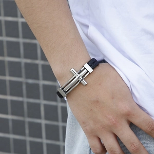 Men's black braided leather bracelet with silver stainless steel cross on wrist