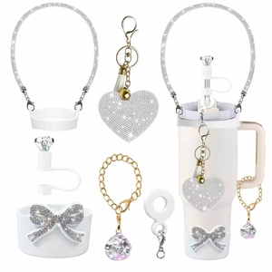 Sparkly white rhinestone accessory set for tumbler featuring heart keychain and bow charms