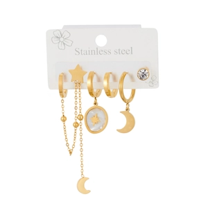 Detail of gold plated stainless steel earring set with star and moon charms on white card