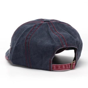 Back view of a vintage washed denim newsboy cap in dark grey with red stitching details