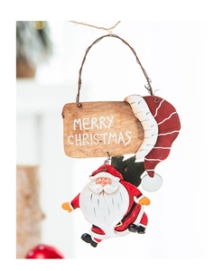 Detail of Santa Claus resin ornament with Merry Christmas wooden sign and red hanging rope