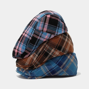 Checkered newsboy caps in diverse colors for men and women, vintage beret hat stack