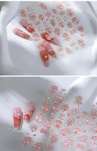 Detailed 5D butterfly and tulip nail art stickers with pink bow and pearl elements