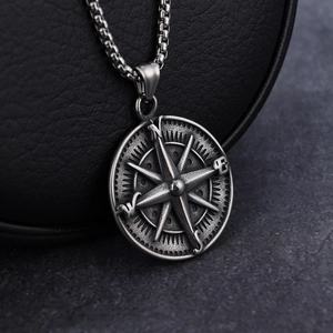 Vintage stainless steel compass pendant necklace with detailed N-E-S-W engraving
