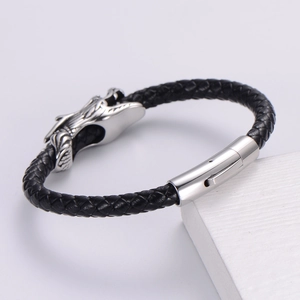 Pulsera de cuero trenzado negro para hombre con un cierre vintage de cabeza de dragón