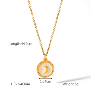 Detail of gold moon pendant necklace with length 44.9cm and 1.54cm diameter measurement