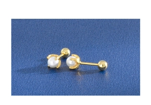 Detailed macro of 925 silver mini pearl earrings with gold-plated screw ball backings