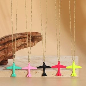 Chic airplane pendant necklaces in five vibrant spray paint colors with gold thin chains
