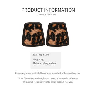 Detail view of leopard print faux leather trapezoid earrings with dimensions 2.8x2.6cm