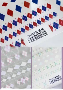 Detailed view of ultra-thin red argyle nail stickers with professional adhesive finish