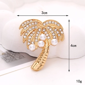 Golden palm tree brooch with white pearls and sparkling crystals, size 3cm by 4cm