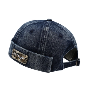 Vintage navy denim docker hat with leopard patch and metal strap for men and women